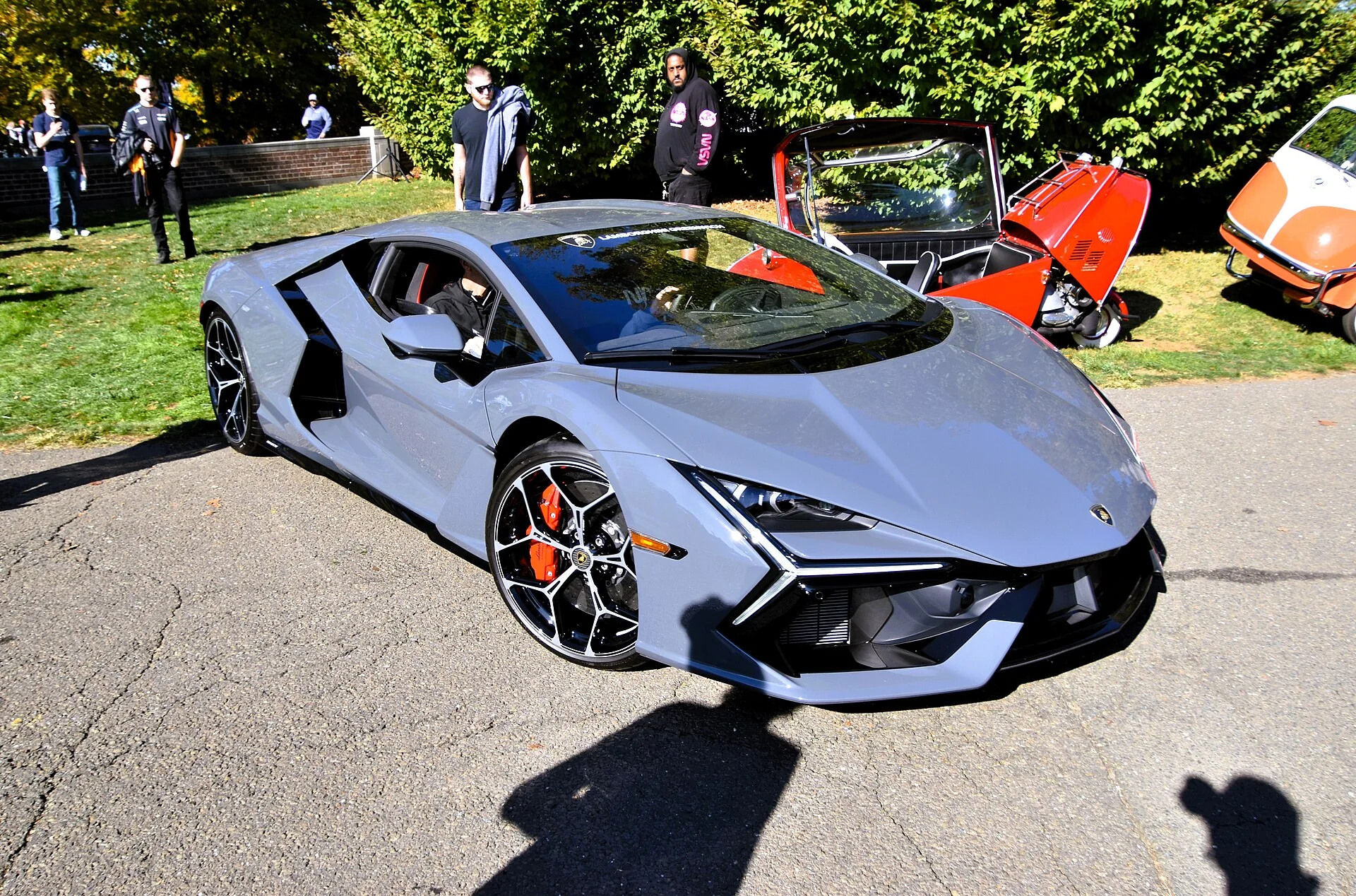 Grey Lamborghini Revuelto in a front three-quarter view outdoors